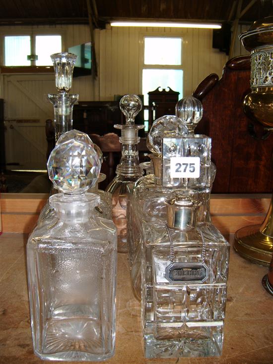Collection of cut glass ware incl decanters with silver labels, etc